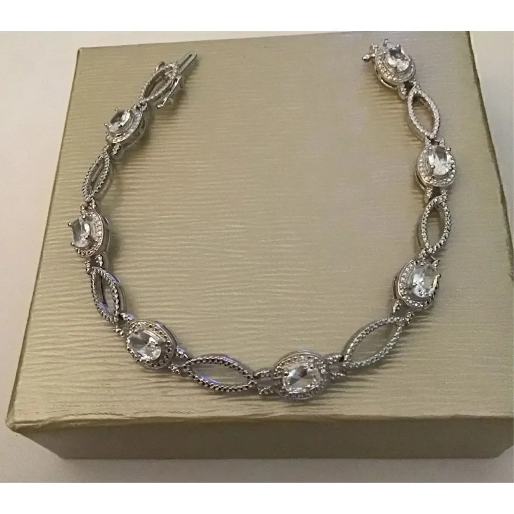 3.61 Ct. Oval Halo Design White Sapphire Gemstone Tennis Bracelet